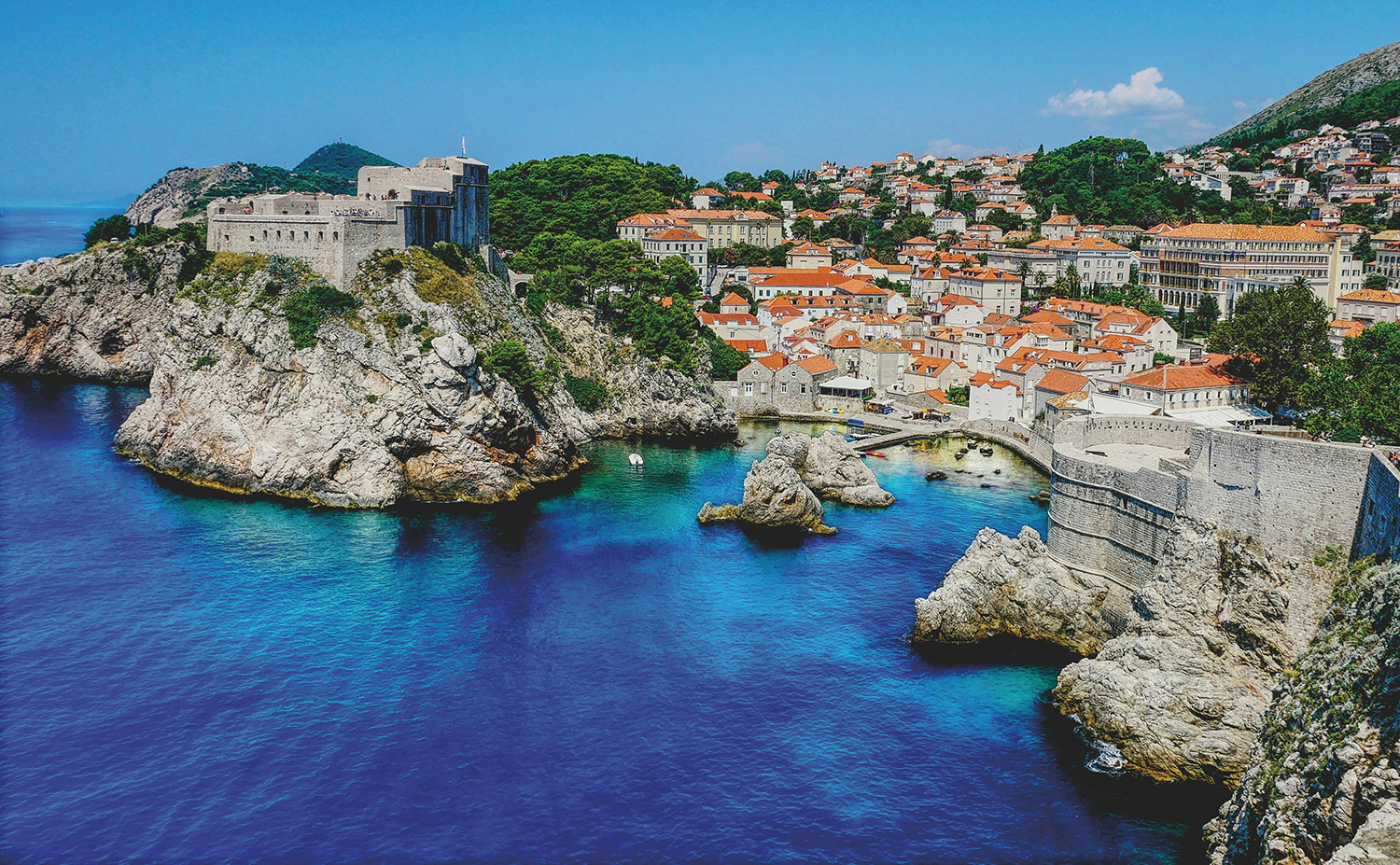 Scenic Croatian coastal landscape featuring Blitz Travel luxury transportation services in partnership with Carey International