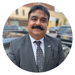 Portrait of Faisal, professional chauffeur at Carey UK