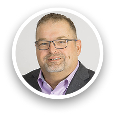 Portrait of Ron Hoye, professional team member at Carey UK